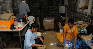 Aménagement d’un village des premiers travailleurs engagés à l’Aapravasi Ghat.