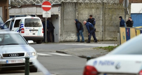 Des policiers des forces spéciales belges à proximité de la zone des fusillades à Bruxelles, le 15 mars 2016.