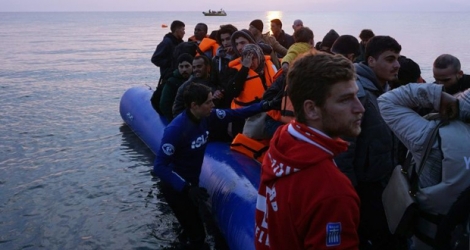 Des migrants arrivent le 20 mars 2016 sur l'île de Lesbos.