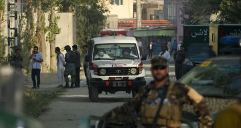 Une ambulance et des forces de sécurité à Kaboul.
