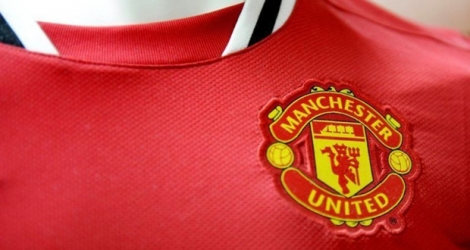 Emblême de Manchester United sur un maillot .