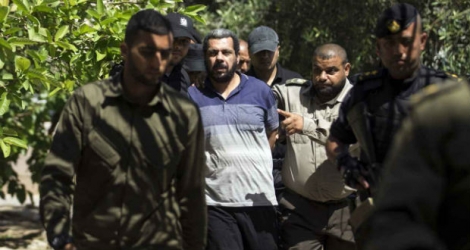 Le procès des trois hommes, déjà condamnés par la rue gazaouie, s'était ouvert lundi.
