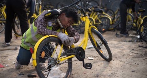 Selon le Centre de recherche chinois sur le commerce électronique, la Chine comptait l'an dernier 16,9 millions d'utilisateurs de vélos partagés, un chiffre qui devrait atteindre les 50 millions à la fin de cette année. © Nicolas ASFOURI / AFP