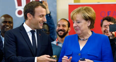 Emmanuel Macron et Angela Merkel autour du leadership en Europe.