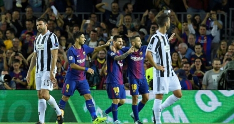 La joie de Lionel Messi et ses coéquipiers après un de ses deux buts contre la Juventus au Camp Nou, le 12 septembre 2017