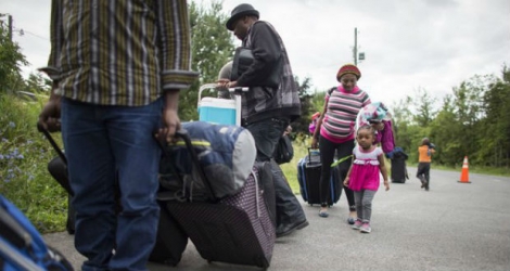 Plus de 6.000 Haïtiens sont arrivés au Canada de février à octobre, mais seulement 298 d'entre eux ont jusqu'à maintenant été entendus par la Commission de l'immigration et du statut de réfugié.