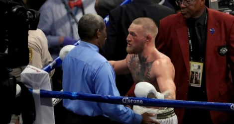 La star irlandaise de MMA Conor McGregor lors de son combat face à l'Américain Floyd Mayweather, selon les règles de la boxe anglaise, le 26 août 2017 à Las Vegas.