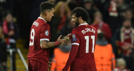 Les buteurs de Liverpool Roberto Firmino et Mohamed Salah lors du match face à la Roma, le 24 avril 2018 à Anfield.