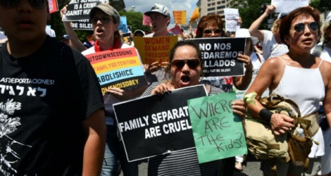 Des manifestants à Washington le 28 juin 2018, réclamant le regroupement des enfants de clandestins avec leurs parents.