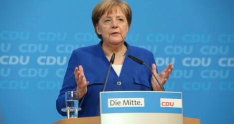 La chancelière allemande Angela Merkel fait une déclaration à la presse au siège de la CDU, le 2 juillet 2018 à Berlin.