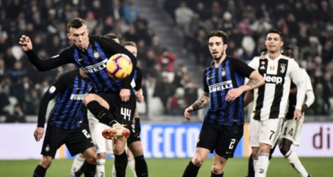 L'Inter Milan, avec ses Croates Ivan Perisic et Sime Vrsaljko, reste sur une défaite en Serie A, sur la pelouse de la Juventus, le 7 décembre 2018.