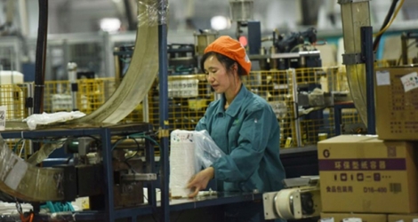  Une ouvrière dans une usine à Hangzhou le 21 janvier 2019