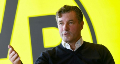Le directeur sportif du Borussia Dortmund Michael Zorc s'exprime devant les reporters au siège du club, le 7 février 2019.
