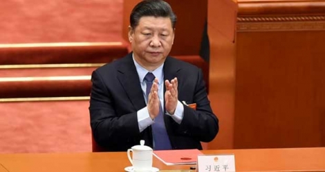  Le président chinois Xi Jinping lors de la session annuelle de l'Assemblée nationale populaire à Pékin, le 15 mars 2019.