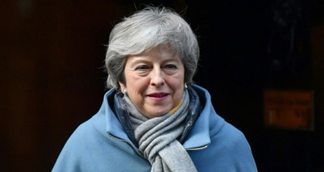 La Première ministre britannique Theresa May sort du 10 Downing Street, le 14 mars 2019 à Londres.