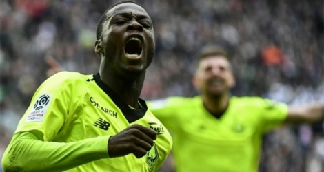 L'attaquant ivoirien de Lille Nicolas Pépé exulte après un but contre Saint-Etienne, le 10 mars 2019 à Geoffroy-Guichard.