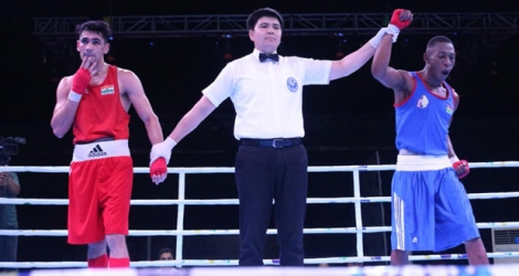 Richarno Colin jubile après sa victoire au second round, hier, au Karmabir Nabin Chandra Indoor stadium en Inde.  © Boxing federation of India