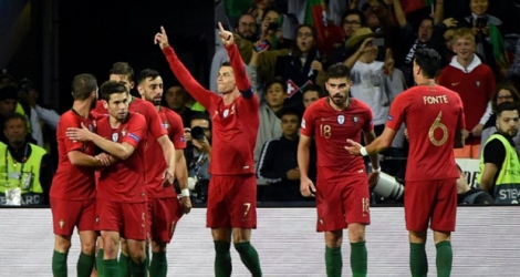 La star du Portugal Cristiano Ronaldo (c) auteur d'un triplé contre la Suisse en demi-finale de la Ligue des Nations, le 5 juin 2019 à Porto.