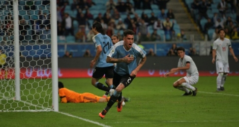 Le défenseur central uruguayen Jose Maria Gimenez buteur lors du match de phase de groupes de la Copa America face au Japon, à Porto Alegre au Brésil, le 20 juin 2019.