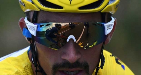 Le peloton du Tour de France, dont le maillot jaune est toujours sur les épaules du Français Julian Alaphilippe, s'est remis en marche mercredi à Albi, après une journée de repos Photo Anne-Christine POUJOULAT. AFP