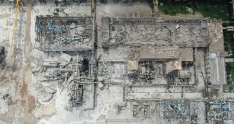 Des bâtiments endommagés le 20 juillet 2019 au lendemain de l'explosion dans une usine de gazéification du centre de la Chine.