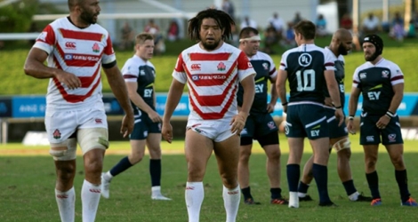 Le capitaine du Japon Michael Leitch (g) auteur de 2 essais face aux Etats-Unis lors de la Coupe des nations du Pacifique de rugby, le 10 août 2019 à Suva Photo Lice MOVONO. AFP