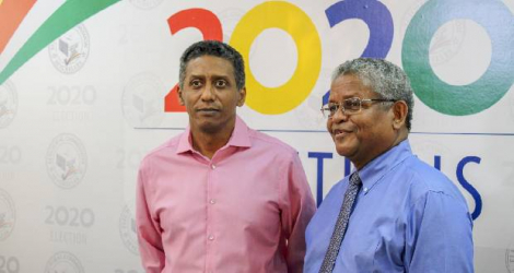 Outgoing Seychelles president Danny Faure (left) with newly-elected President Wavel Ramkalawan.