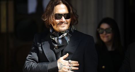 L'acteur américain Johnny Depp arrive à la Haute cour de Londres, le 24 juillet 2020.