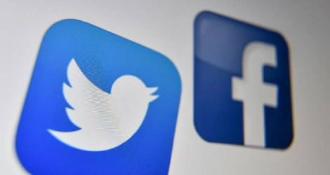 Facebook et Twitter étaient mobilisés mercredi pour contrôler le flot de désinformation et d'accusations alors que le décompte des voix se poursuit aux Etats-Unis Photo Denis Charlet. AFP