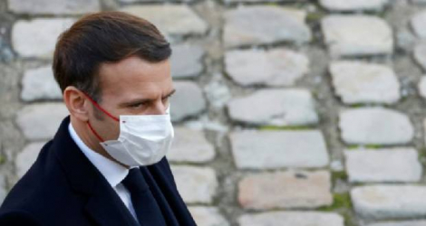 Emmanuel Macron le 26 novembre 2020 lors de la cérémonie d'hommage à Daniel Cordier aux Invalides Photo Ludovic MARIN. AFP