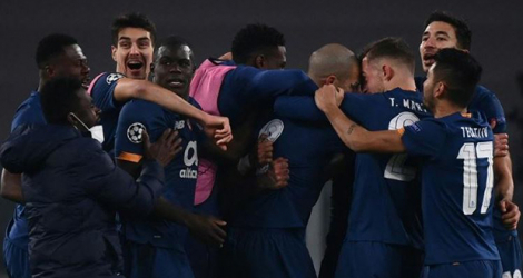 Les joueurs de Porto fêtent leur second but contre la Juventus lors du 8e de finale retour de la Ligue des champions, à Turin, le 9 mars 2021.