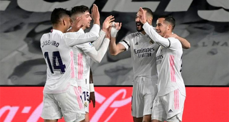 Le Real Madrid dans le sillage de Karim Benzema (2e à droite) s'est offert le clasico contre le Barça au stade Alfredo di Stefano, le 10 avril 2021 afp.com - JAVIER SORIANO