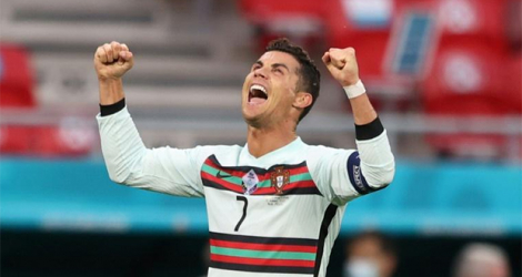 La joie de l'attaquant portugais Cristiano Ronaldo, auteur d'un doublé contre la Hongrie, lors de leur match (groupe F) de l’Euro 2020, le 15 juin 2021 à Budapest.