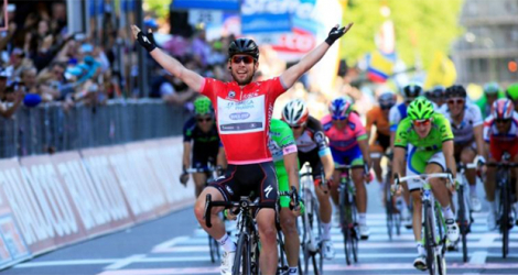 La joie du Britannique Mark Cavendish, après avoir remporté la 21e et dernière étape du Tour d'Italie, le 26 mai 2013 à Brescia.