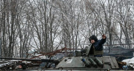 Un soldat ukrainien à bord d'un véhicule de combat BMP-2 à Bakhmout, le 3 février 2023.