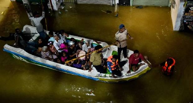 Catastrophe: Images of the Horrific Floods That Claimed Over 1,000 Lives in Indonesia, Thailand, and Sri Lanka