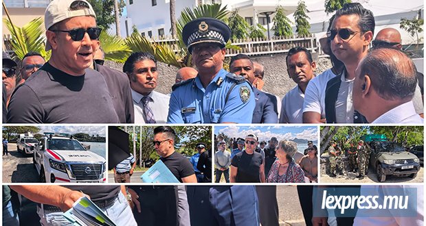 Policiers et membres de la SSU présents pour la visite de Shakeel Mohamed