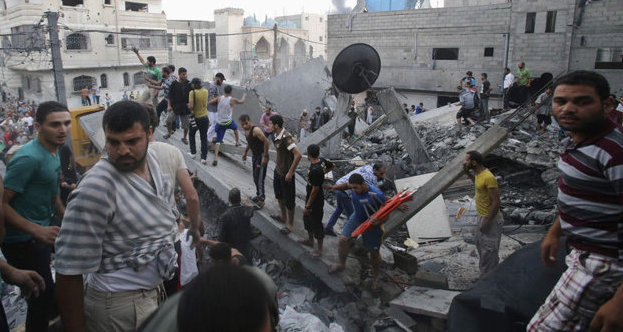 Près de 100 morts à Gaza, Israël promet d'autres raids
