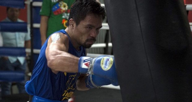 Boxe: Pacquiao prêt à affronter la star du MMA McGregor