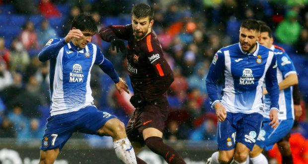 Espagne/22e journée: Piqué maintient le Barça à flot dans le derby (1-1)