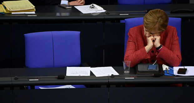 Virus: Merkel prône des restrictions, Biden promet une vaccination record